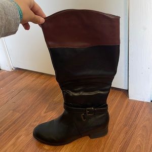 Black and brown riding boots